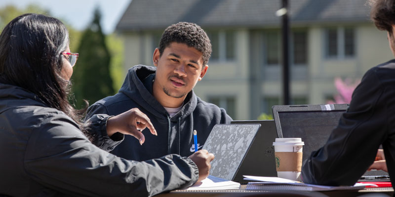 Bryn Athyn College students studying outdoors