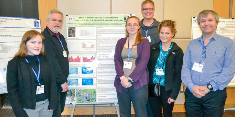 Bryn Athyn College students and professors presenting research poster