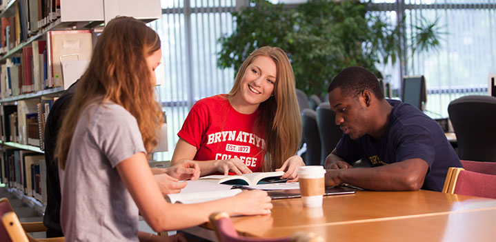 Students collaborate on course work in the Swedenborg Library at Bryn Athyn College