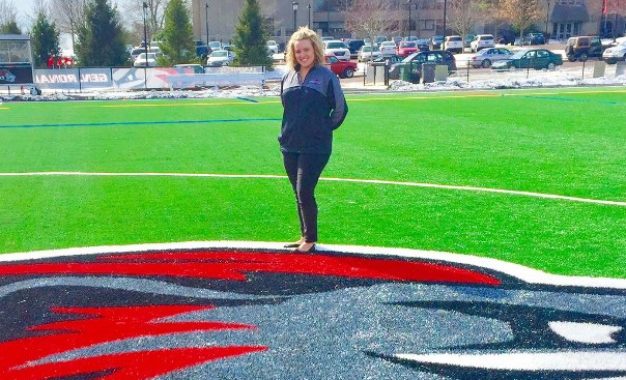 Bryn Athyn College's Head Women's Field Hockey Coach on the turf field