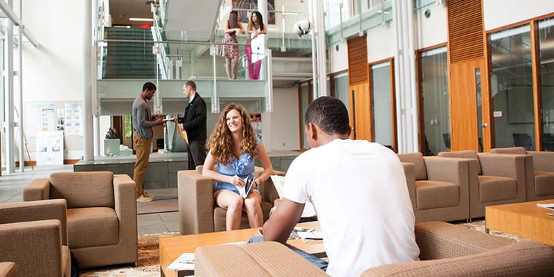 Students sitting in Bryn Athyn College Doering Center Main Lobby