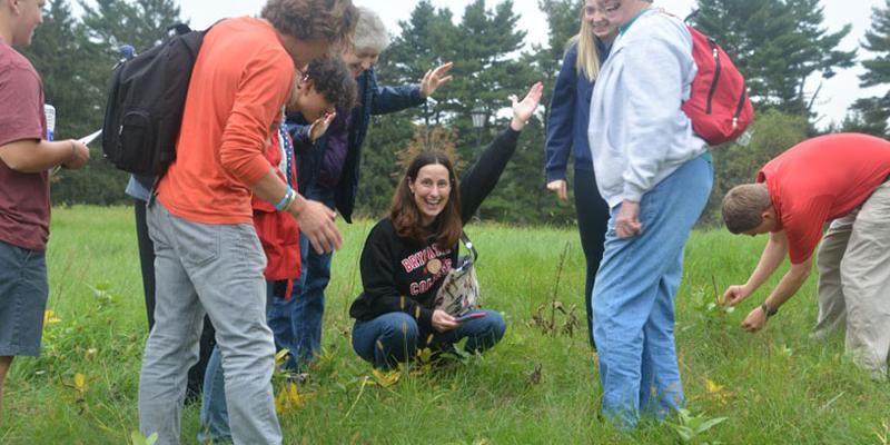 Bryn Athyn College rain garden workshop attendees gather around Suzanne Nelson