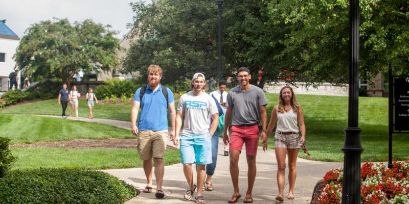 Bryn Athyn College students walking to class on a warm sunny day
