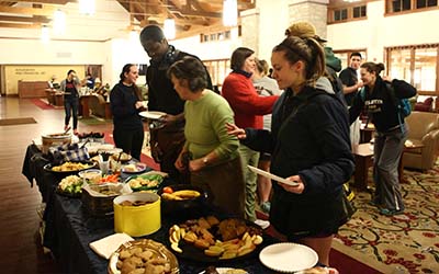 Bryn Athyn College students at snack table