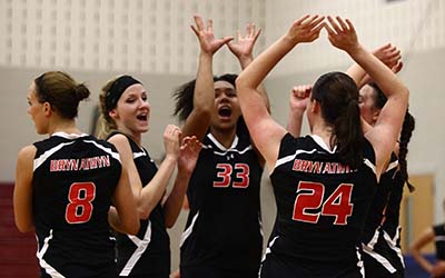 Bryn Athyn College volleyball team cheering