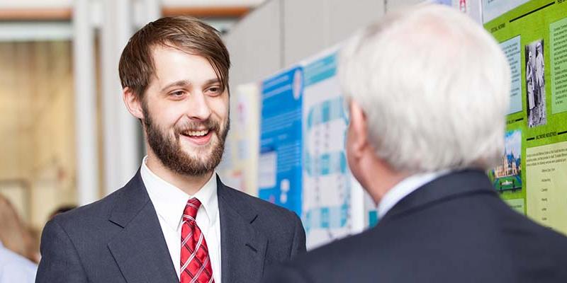 Business student talking at Bryn Athyn College