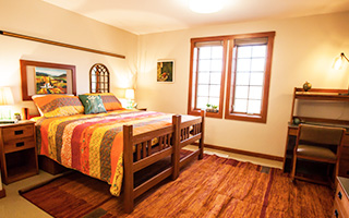 Cozy bedroom inside one of the Cottages on the edge of Bryn Athyn College's campus