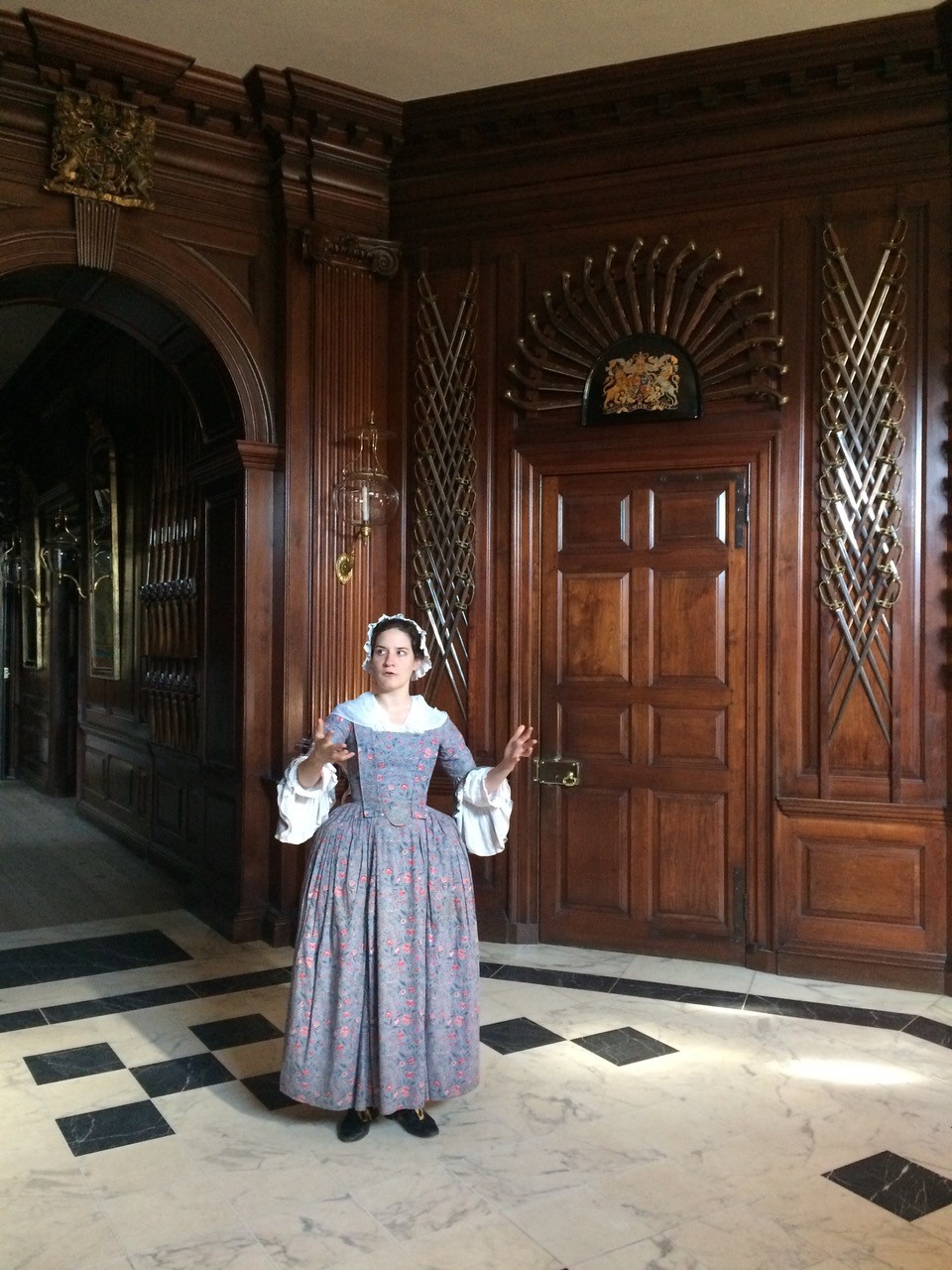 Bryn Athyn College alumna Dara King (’13) guides visitors through the governor’s palace