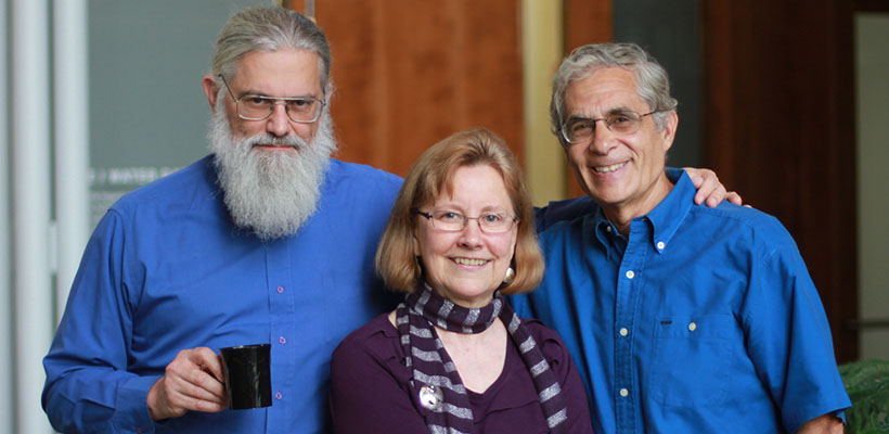 Professors stand together smiling at Bryn Athyn College