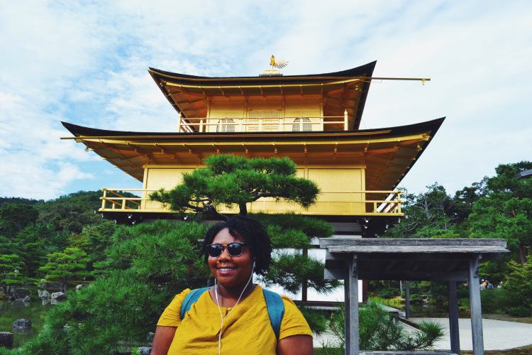 Bryn Athyn College Alumna standing in front of a temple in Japan 