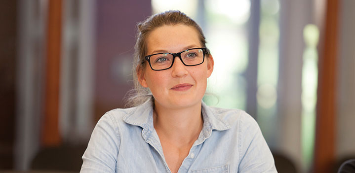 Student sitting in a classroom in Doering Center