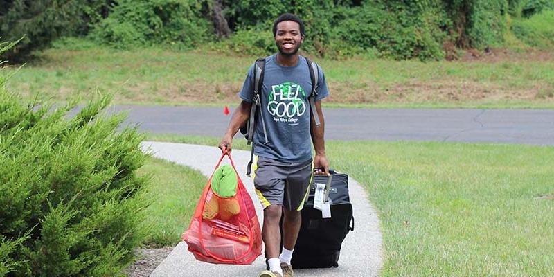 student moving into residence halls