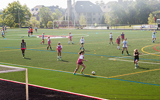 Athletes play soccer on the General Nelson Field at Bryn Athyn College