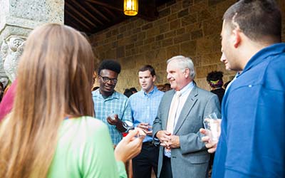 Bryn Athyn College students gather around President Brian Blair