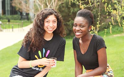 Bryn Athyn College students smiling during a barbecue