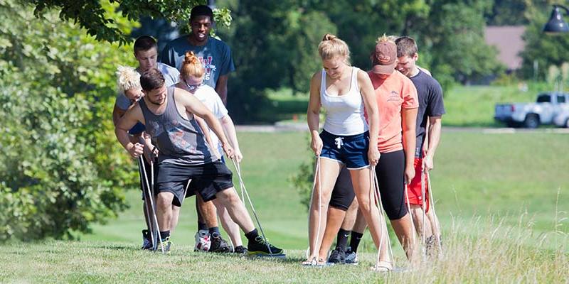 Bryn Athyn College students doing a team building task