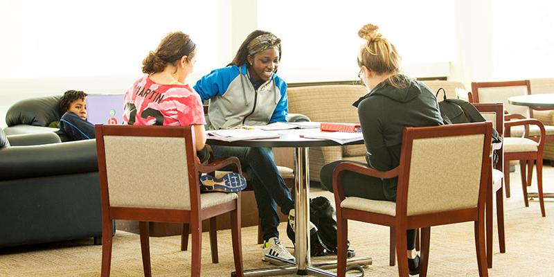 Students studying together at a table