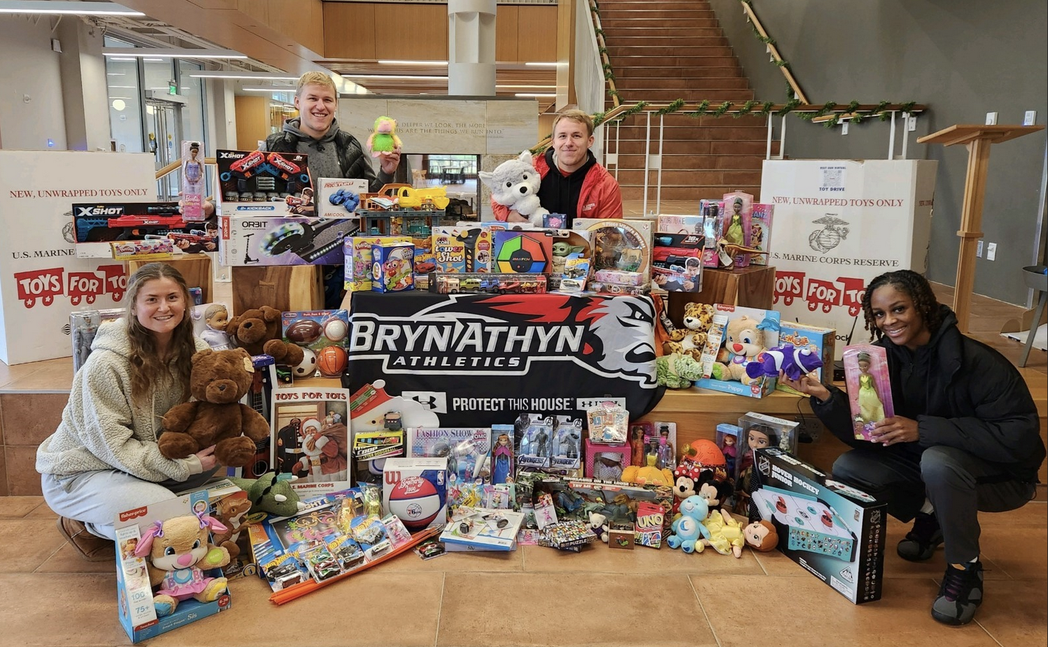 students with collected toys