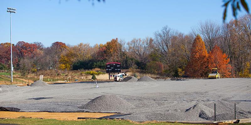 Bryn Athyn College's new turf field under construction with gravel being smoothed 